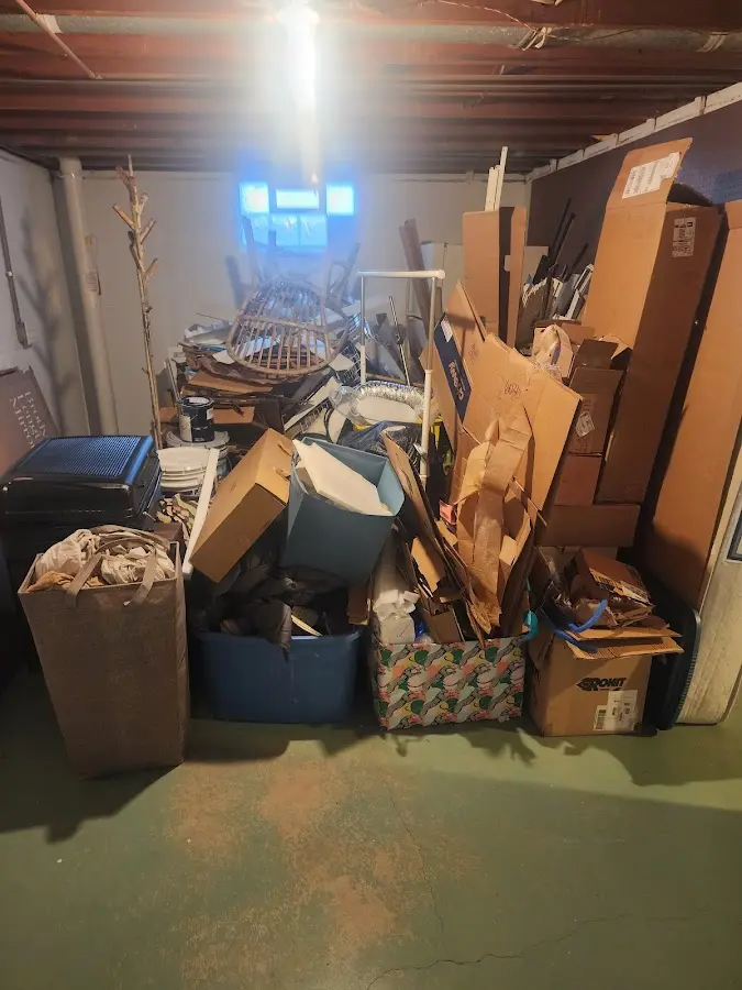 Roll-off dumpster container at job site for 6 Yard Dumpster Rental in Caroline